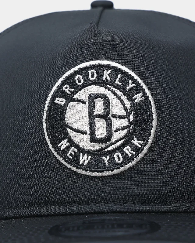 new-era-brooklyn-nets-golfer-trucker-snapback-black-stone